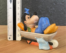 Load image into Gallery viewer, Vintage Walt Disney Productions Porcelain Goofy Napping in Wheelbarrow Figurine
