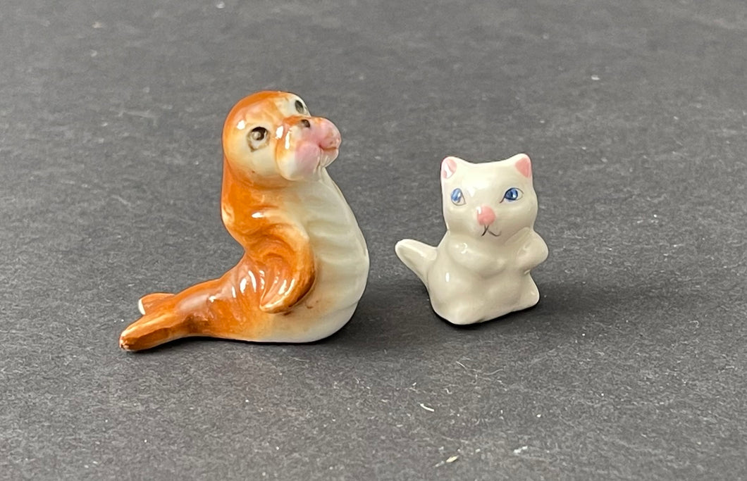 Vintage Porcelain Miniature Baby Walrus and Kitten Figurines