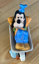 Load image into Gallery viewer, Vintage Walt Disney Productions Porcelain Goofy Napping in Wheelbarrow Figurine
