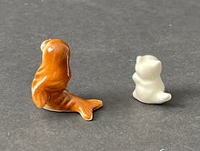 Load image into Gallery viewer, Vintage Porcelain Miniature Baby Walrus and Kitten Figurines
