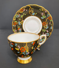 Load image into Gallery viewer, Vintage Tuscan Bone China Black Moriage Tea Cup and Saucer 24kt trim
